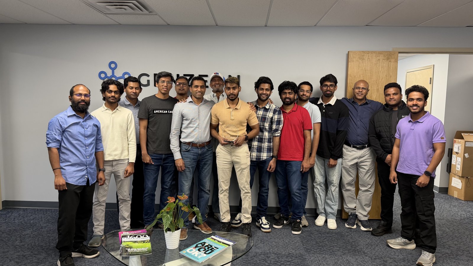 Abhishek Chandragiri (center, holding the award) with the Genzeon Platforms team at the Hypersonic recognition ceremony, Exton office