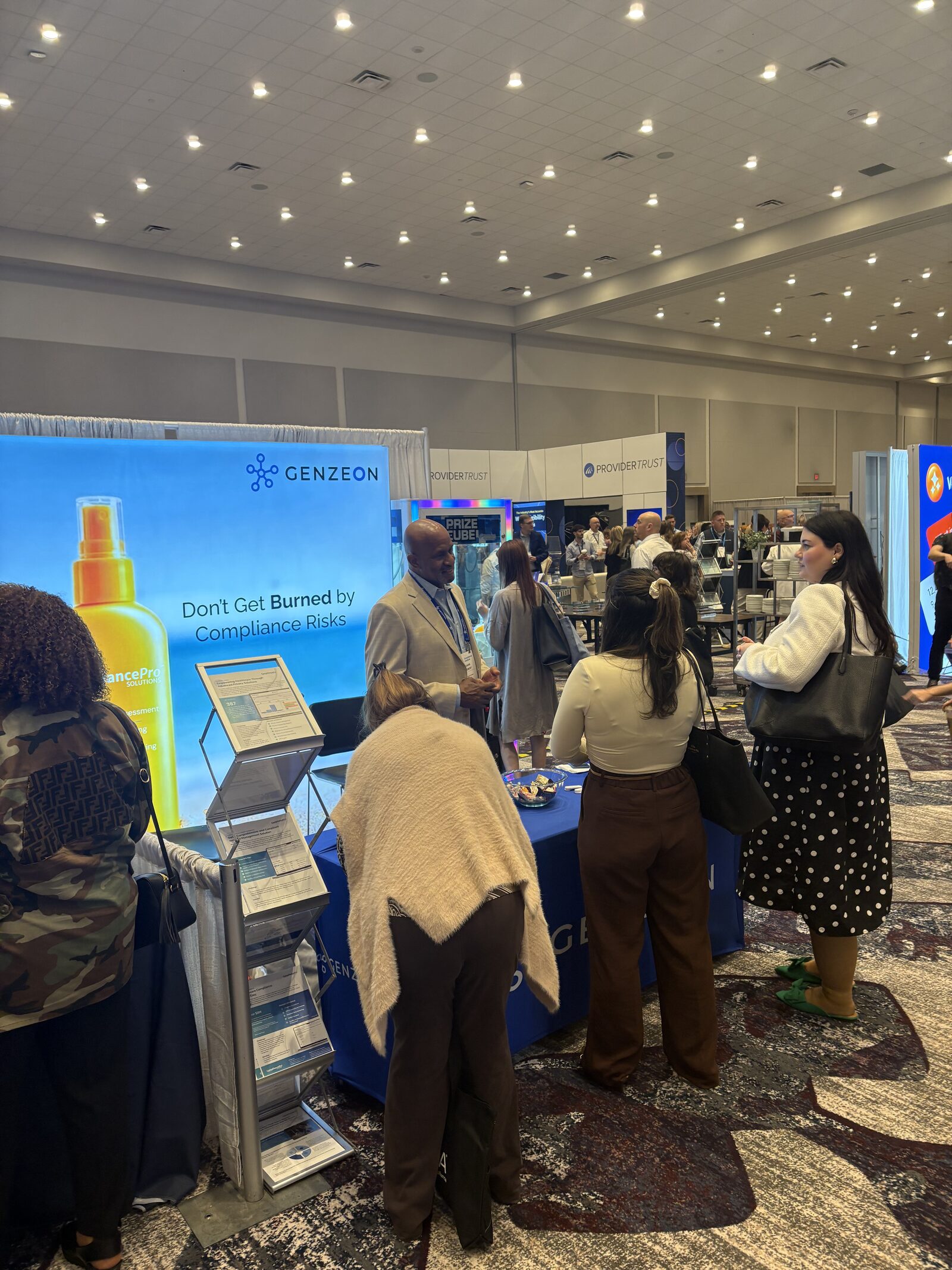 Genzeon Platforms booth at HCCA CI 2026 with privacy and compliance professionals engaged in conversation around the CompliancePro display